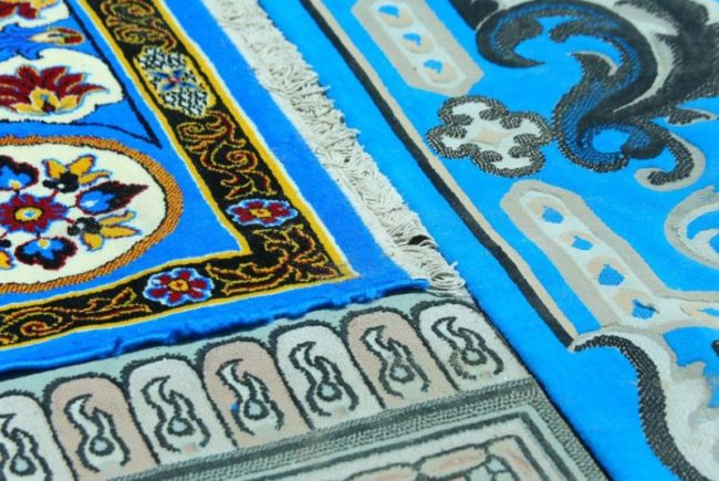 45663928 - blue antique rugs handmade with elaborate geometric figures