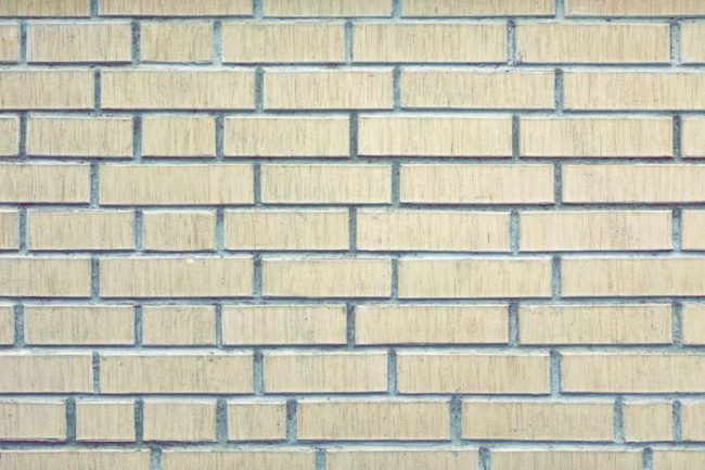 60726465 - white brick wall grunge background or texture, modern bricklaying, textured brickwork, close-up view of modern room or loft interior stonewall.